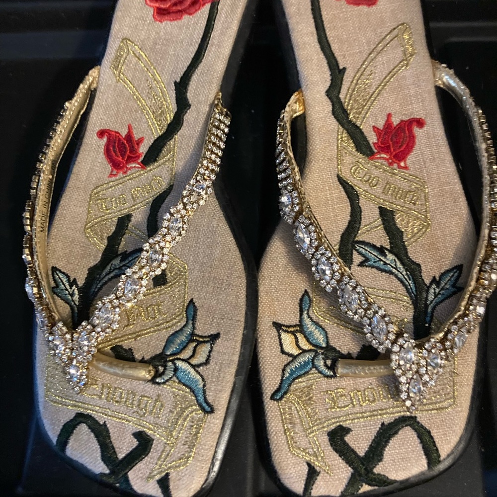 Too much is not enough rhinestone flip flops.New from Nordstroms. Size 6